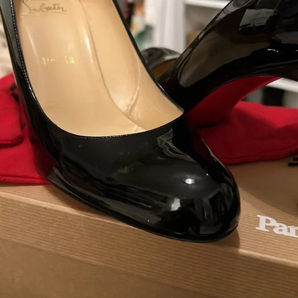 Classic black patent leather red bottom Louboutin heels